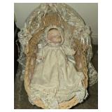 Small porcelain doll with basket