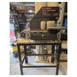 Metal table with band saw and grinder