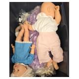 Tote lot of dolls and doll parts