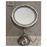 Lighted swivel make up mirror