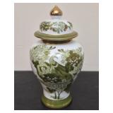 Elegant green urn with gold trim
