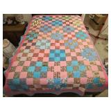 90' by 61' multi colored pink and blue quilt
