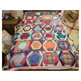 77' by 68' multi colored quilt