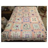 80' by 63' multi colored quilt