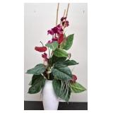 Artificial orchid arrangement in ceramic vase