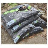 5 bags of black mulch 1 is open