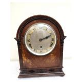 Antique Victorian style arched top mantel clock