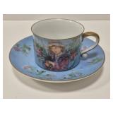 Edna Hibel 'Flower Girl' porcelain cup & saucer