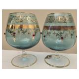 Pair of light blue glass cups