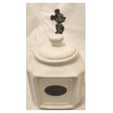 White ceramic sugar canister w Mickey spoon