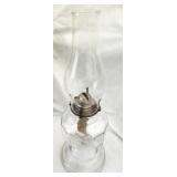 Antique clear glass oil lamp