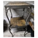 2 metal outdoor tables