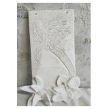 Decorative white plaster wall plaque