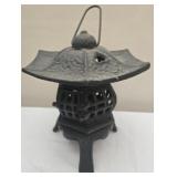 Heavy cast iron candle holder
