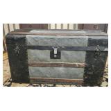 Antique round top steamer trunk