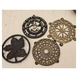 Lot of 4 Misc Cast Iron Metal Trivets