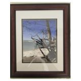 Framed photo of a beach signed by photographer