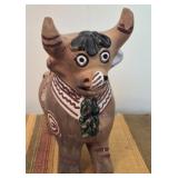 Hand painted Clay bull horns are chipped