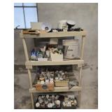 Plastic shelf with painting supplies and more