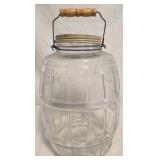 Old glass jar with handle and lid