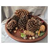 Wooden tray with pinecones