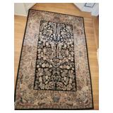Vintage Black and Beige Area Rug