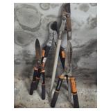 Lot of bush trimmers and limb cutters