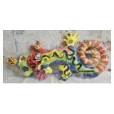 Colorful textured sculpture of a lizard