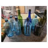 Large lot of Colored Bottle Tree Bottles
