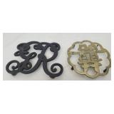 2 Vintage footed trivets
