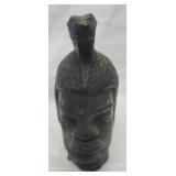 Hawaiian Warrior sculpture in like black lava