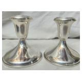 2 Empire sterling silver weighed candle holders