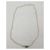 Vintage pearl necklace w 14k clasp w green stone