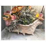 Seashells with faux flowers