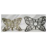 2 butterfly shaped trivets