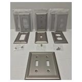 Brushed nickel wall plates