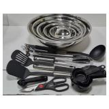 Lot of mixing bowls and kitchen utensils