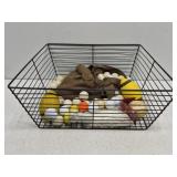 Wire basket of golf balls & more