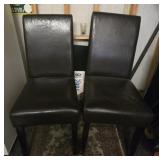Pair of faux leather chairs