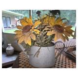 Watering can with sunflowers