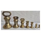 Antique graduated brass bell scale weights