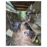 Huge outdoor lot of shovels, wheelbarrow, and more