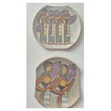 Pair of vintage clay wall decor
