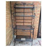 Black metal outdoors flower rack