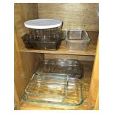 Cabinet of Glass Pyrex Casserole Dishes