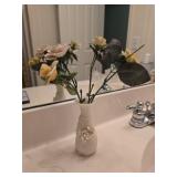 Porcelain vase with porcelain flowers