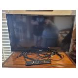 SEIKI flatscreen TV w remote & 2 HDMi cords