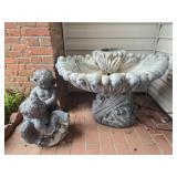 Solid concrete fountain base and cherub top