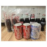 Estate lot of coca-cola bottles and cans