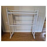 White wooden blanket display